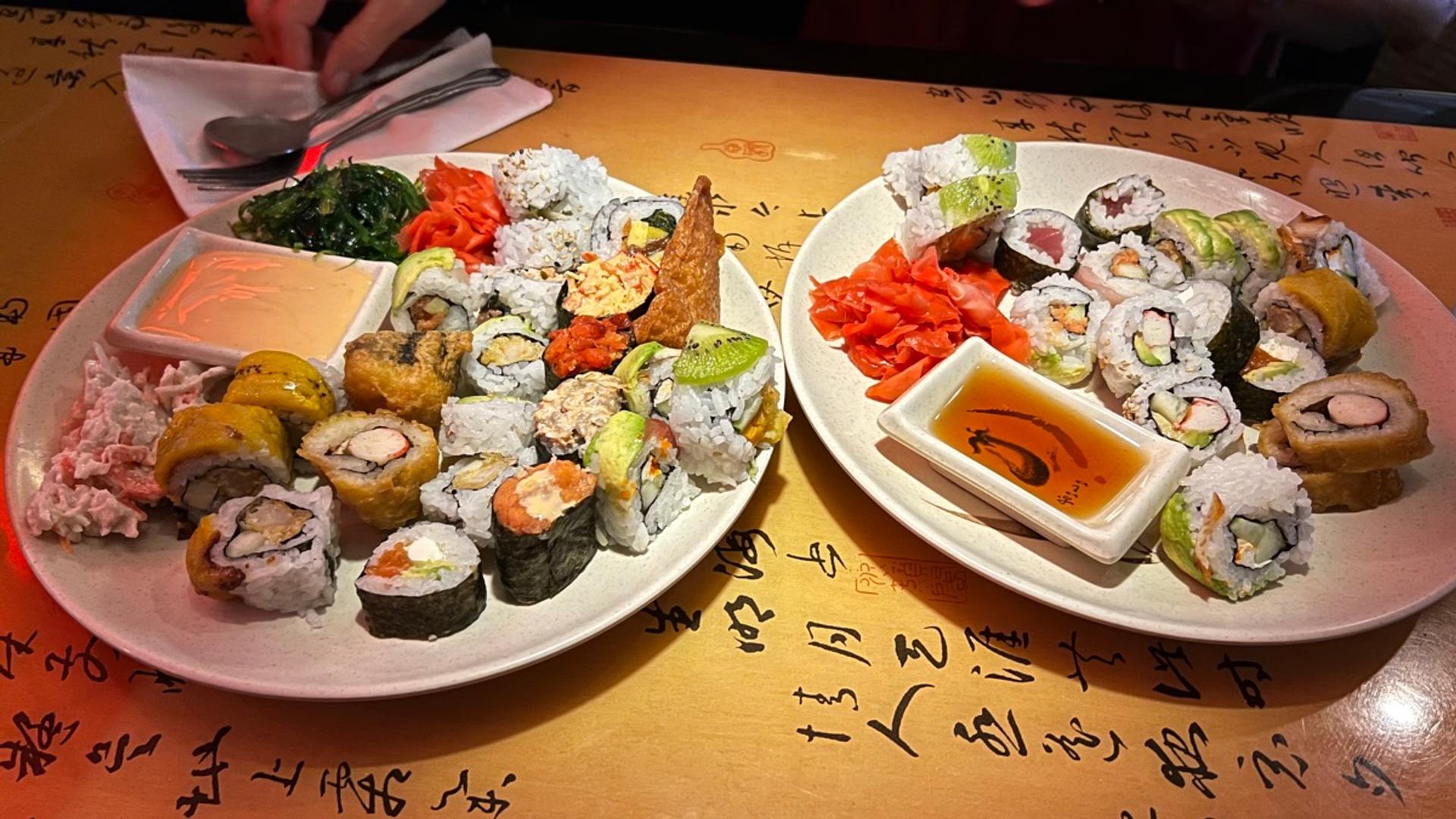 Assorted sushi and maki rolls with soy sauce at Aki Japanese Buffet